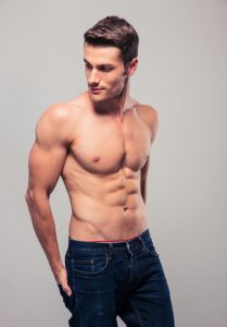 Muscular young man posing