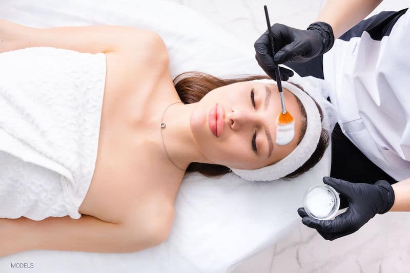 Woman getting a chemical peel.